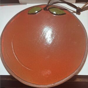 Handcrafted 8” pottery tomato hot plate/cutting board